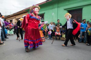 Colorful costumes and traditional dances at the San Sebastian Festival parade in Diriamba, Nicaragua.